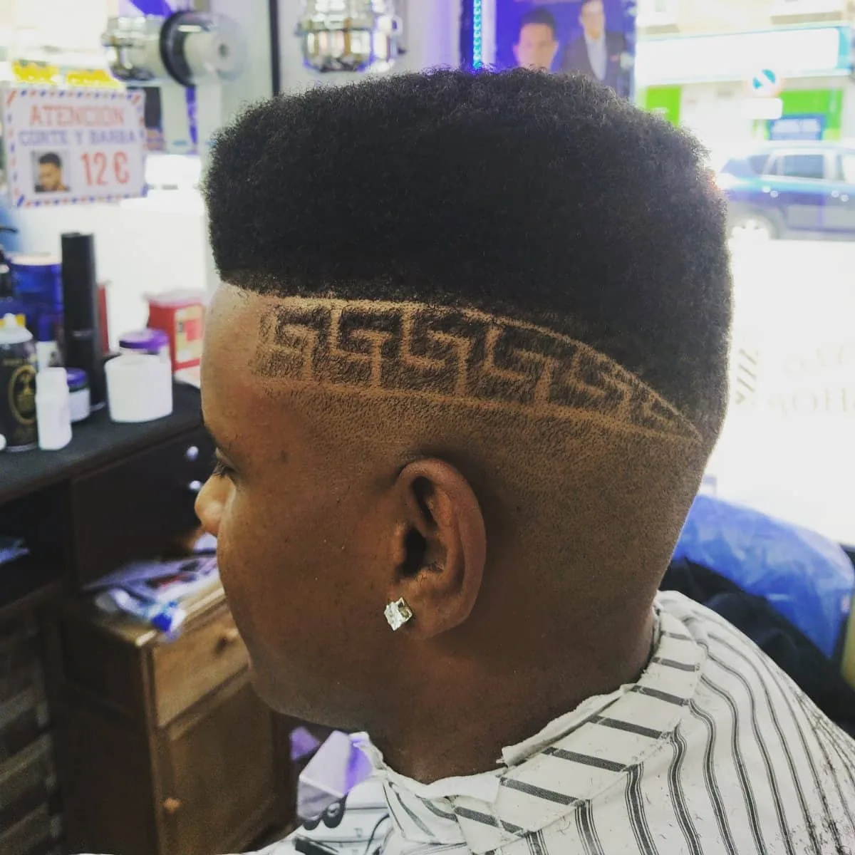 Hair tattoo geométrico y degradado realizado por Martín El Maestro en Leganés
