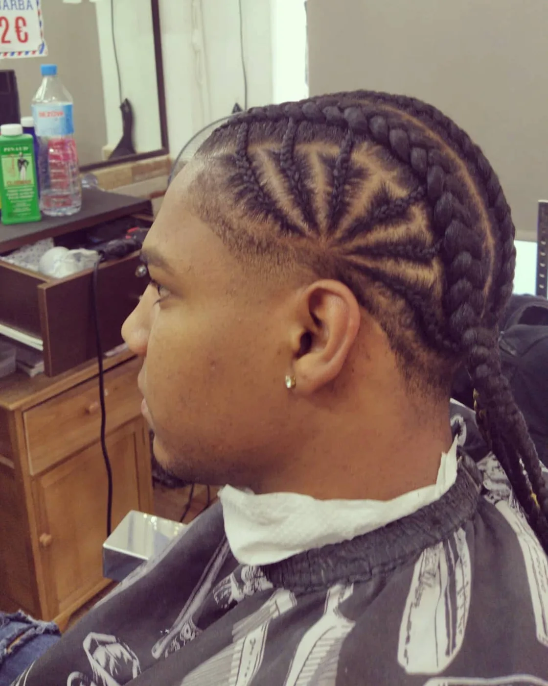 Trabajo con trenzas y laterales definidos en Martín El Maestro Barber Shop de Leganés