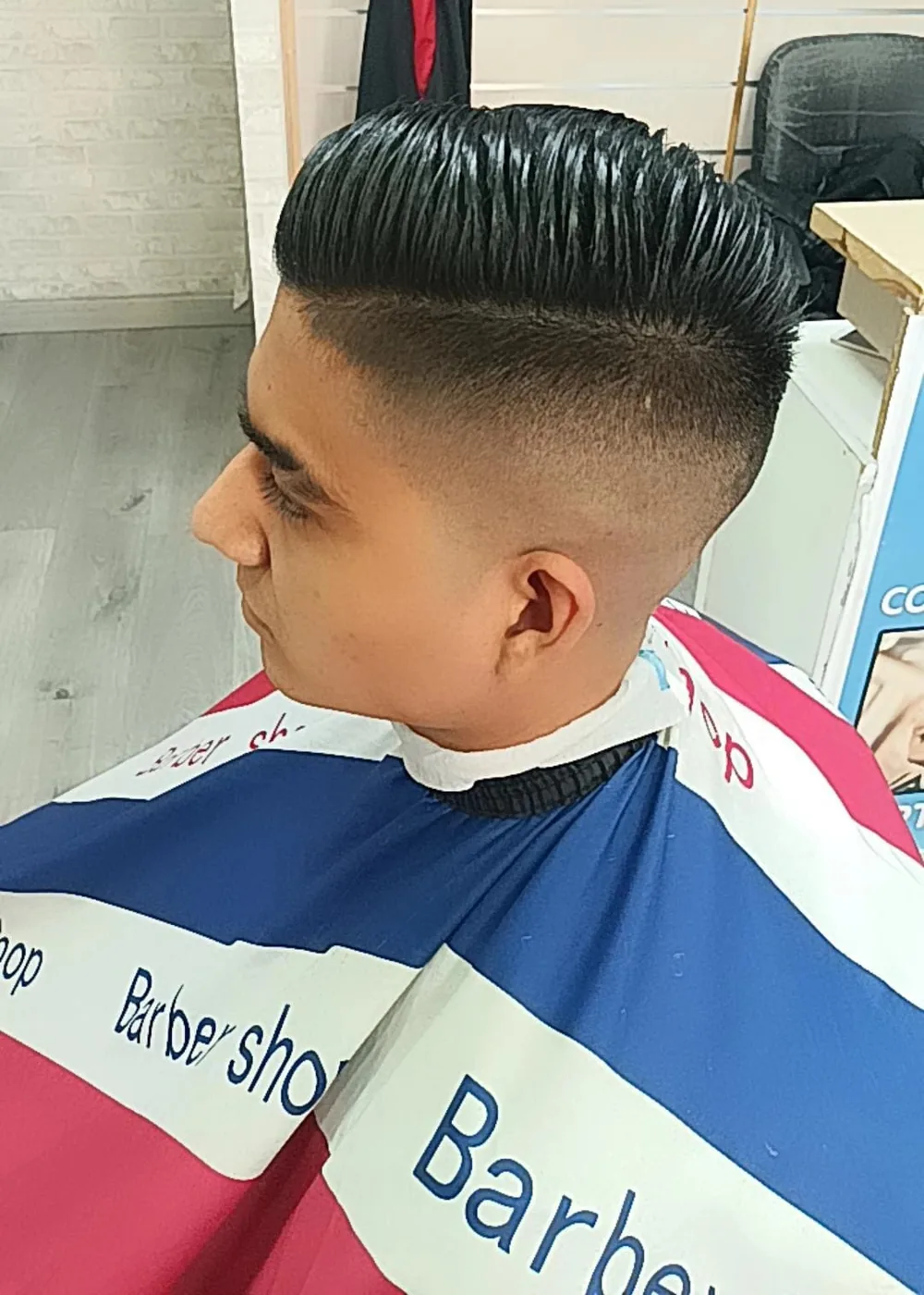 Pompadour con fade limpio realizado en Martín El Maestro Barber Shop de Leganés